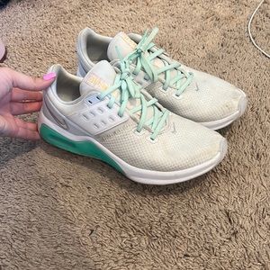 White and teal nike shoes